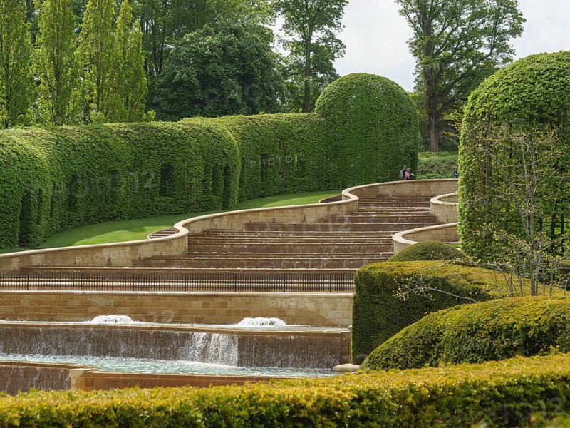 Beautifully landscaped garden with waterfall, steps and manicured hedges, Newcastle, England, United Kingdom, Europe