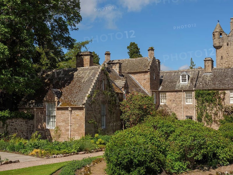 An old building with castle and garden, surrounded by stone walls and dense vegetation, inverness, Scotland, United Kingdom, Europe
