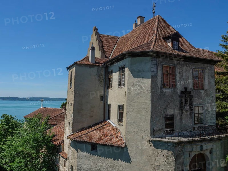 Castle overlooks a lake and is surrounded by trees, with historical details, Meersburg, Germany, Europe