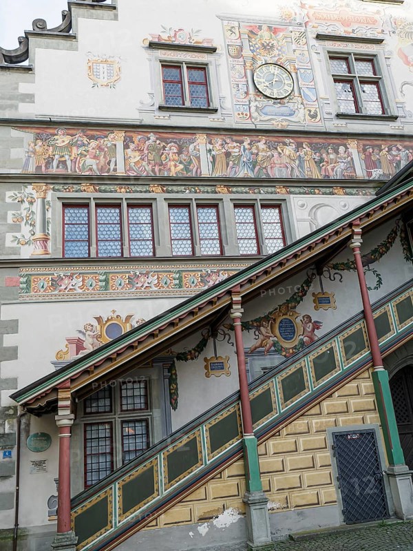 Richly painted historic façade with ornate murals, windows and staircase, Meersburg, Lake Constance, Germany, Europe
