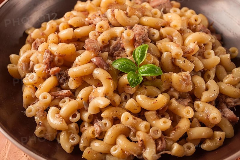 Pasta with stewed meat, pasta in the navy, horns, homemade, no people
