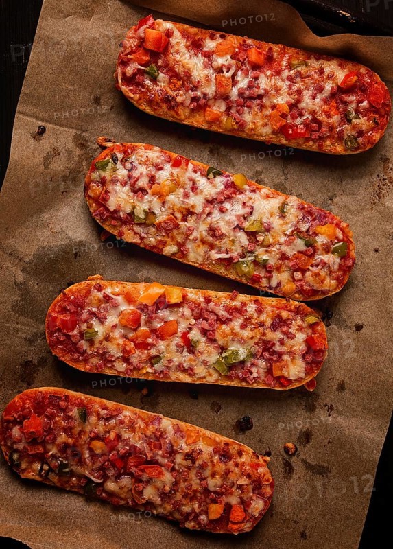 Pizza on a baguette, top view, close-up, no people, fast food, street food