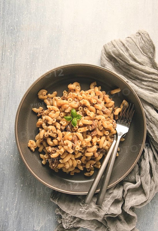 Pasta with stewed meat, pasta in the navy, horns, homemade, no people