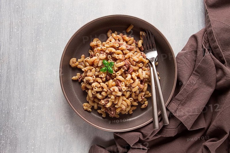 Pasta with stewed meat, pasta in the navy, horns, homemade, no people