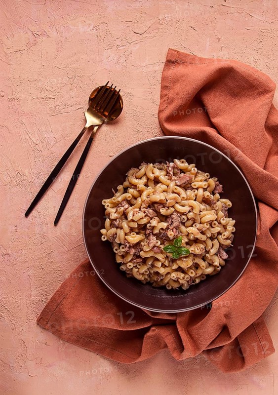 Pasta with stewed meat, pasta in the navy, horns, homemade, no people