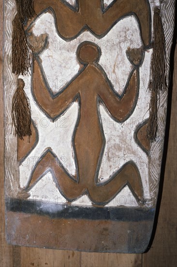Asmat people: ethnic group living in the Papua province of Indonesia, along the Arafura Sea. Asmat carving from the village of Bewar Laut, at the Asmat Museum in Agats. Photograph taken by Francois Gohier in 1976