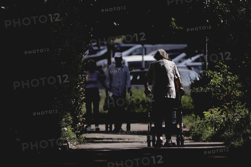 A woman with a rollator, photographed in Berlin, 07/08/2024