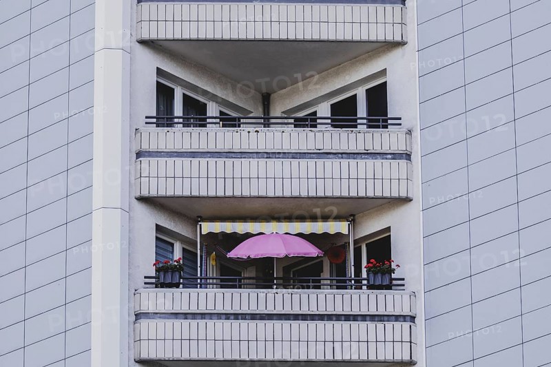 Parasol on the balcony of a prefabricated building, taken in Berlin, 07/08/2024
