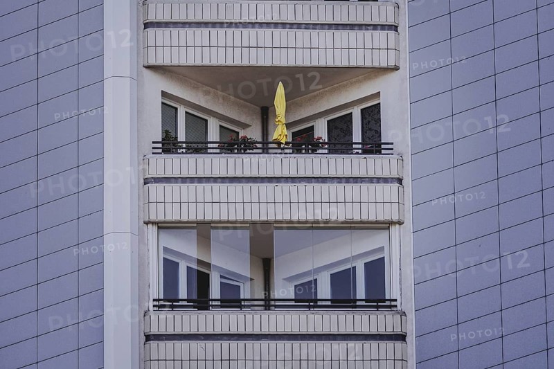 A parasol on a balcony of a block of flats, taken in Berlin, 07/08/2024