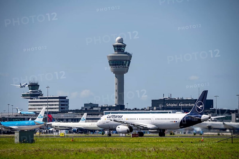 Aircraft at Amsterdam Schiphol Airport, taking off on the Aalsmeerbaan, 18L/36R, Lufthansa Airbus A321-231, air traffic control tower, terminal, Netherlands