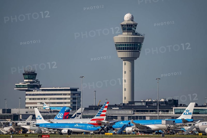 Aircraft at Amsterdam Schiphol Airport, taxiway, apron, air traffic control tower, terminal, Netherlands