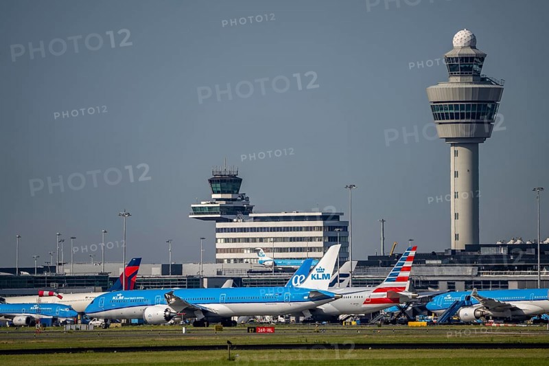 Aircraft at Amsterdam Schiphol Airport, taxiway, apron, air traffic control tower, terminal, Netherlands