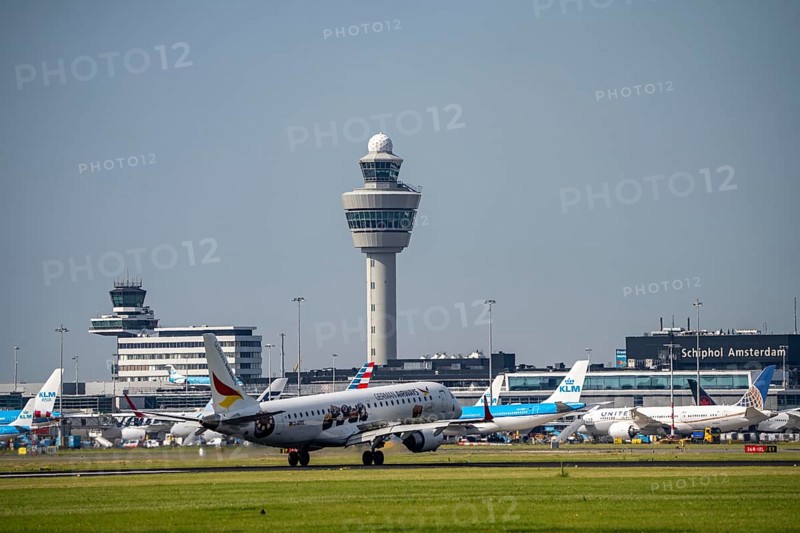 German Airways Embraer E190SR, aircraft landing at Amsterdam Schiphol Airport, Buitenveldertbaan, 09/27, Air Traffic Control Tower, Terminal, Netherlands