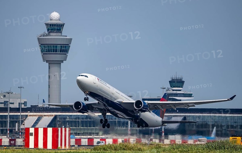 Delta Air Lines Airbus A330, aircraft taking off at Amsterdam Schiphol Airport, Kaagbaan, 06/24, air traffic control tower, terminal, Netherlands