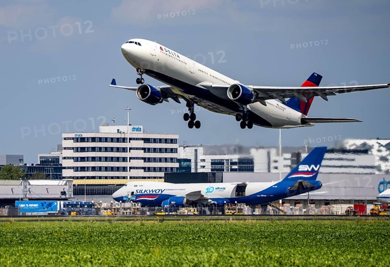 Delta Air Lines Airbus A330-323, aircraft taking off at Amsterdam Schiphol Airport, Kaagbaan, 06/24, Terminal, Netherlands
