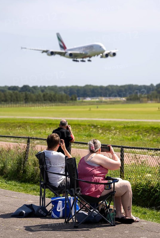 Amsterdam Schiphol Airport, planespotters, aircraft enthusiasts, at the Buitenveldertbaan, watch the air traffic, Netherlands