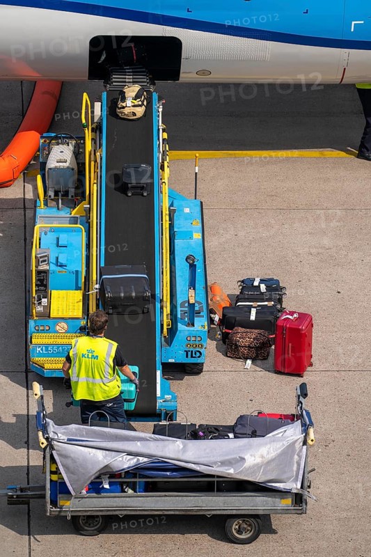Amsterdam Schiphol Airport, loading baggage onto a plane, Boeing 737, Netherlands