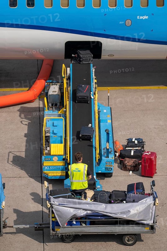 Amsterdam Schiphol Airport, loading baggage onto a plane, Boeing 737, Netherlands