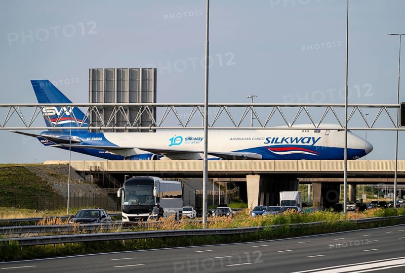 Amsterdam Schiphol Airport, Silk Way West Airlines, Boeing 747-4R7F cargo plane on the taxiway, bridge over the A4 motorway, connection from the Polderbaan runway to the terminal, Netherlands