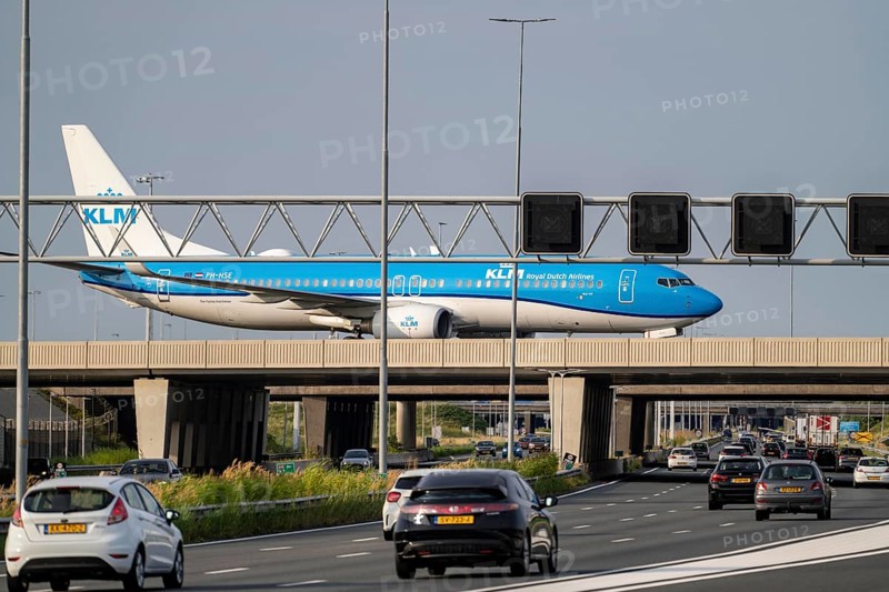 Amsterdam Schiphol Airport, KLM Boeing 737 aircraft on the taxiway, bridge over the A4 motorway, connection from the Polderbaan runway to the terminal, Netherlands
