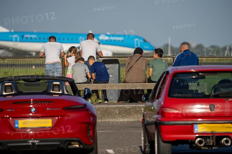 KLM aircraft after landing at Amsterdam Schiphol Airport, Polderbaan, 18R/36L, spotter spot, spectators at the runway, Netherlands