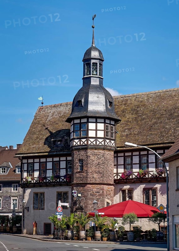 Ratskeller tower and the south side of the historic town hall in Weser Renaissance style in the town centre. Höxter, Weserbergland, North Rhine-Westphalia, Germany, Europe