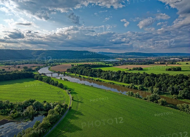 The Upper Weser flows through the southern Weserbergland between Beverungen and Höxter. Aerial photo. North Rhine-Westphalia, Germany, Europe