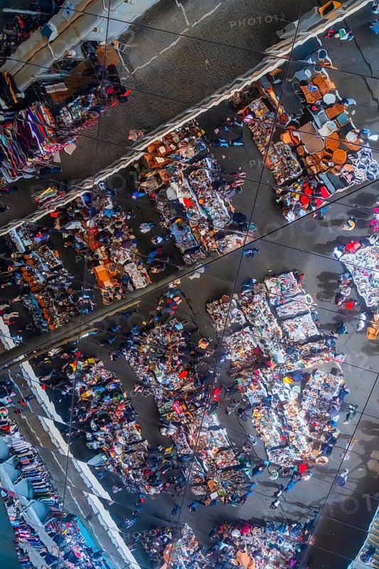 Reflection of the flea market in the modern roof construction of the Mercat dels Encants in Barcelona, Spain, Europe