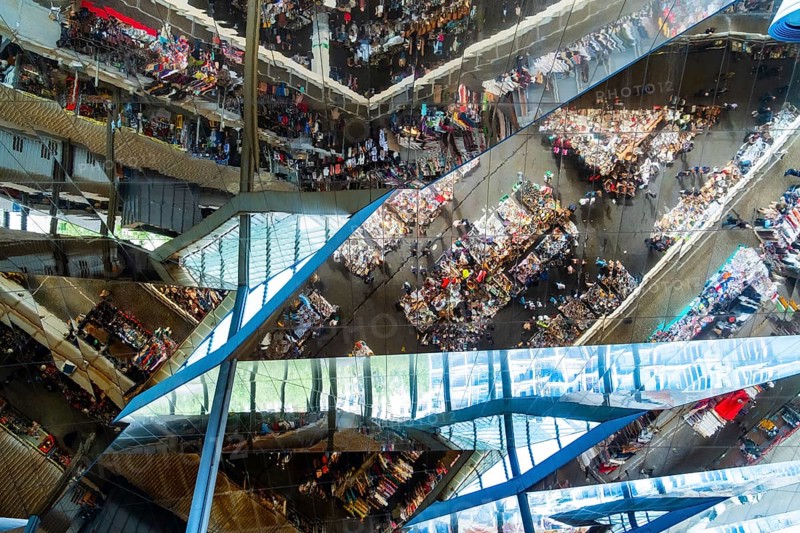 Reflection of the flea market in the modern roof construction of the Mercat dels Encants in Barcelona, Spain, Europe