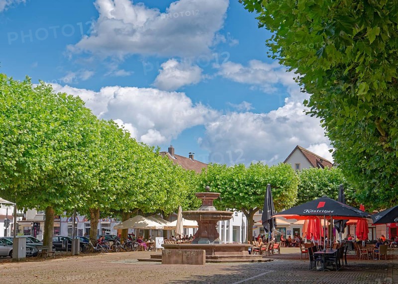 Historic market square and market fountain in the town centre of Holzminden. Weserbergland, Lower Saxony, Germany, Europe