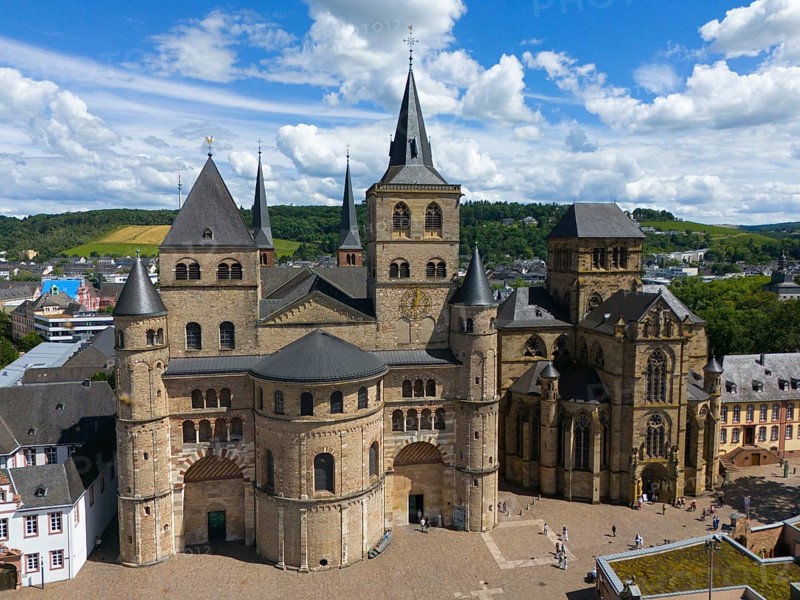 Historic cathedral with many towers under a clear sky and white clouds in Trierr, aerial view, Trier Cathedral, Episcopal Church, Trier, Rhineland-Palatinate, Germany, Europe
