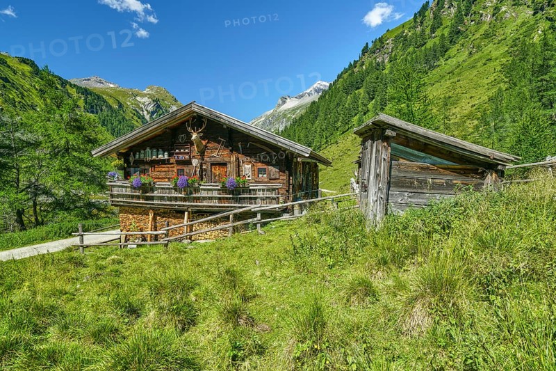 Alpine hut in the Kalser Tauern, blue sky, snow-covered mountains, Dorfertal, Hohe Tauern National Park, Kals am Grossglockner, East Tyrol