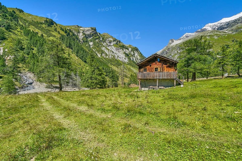 Alpine hut in the Kalser Tauern, blue sky, snow-covered mountains, Dorfertal, Hohe Tauern National Park, Kals am Grossglockner, East Tyrol
