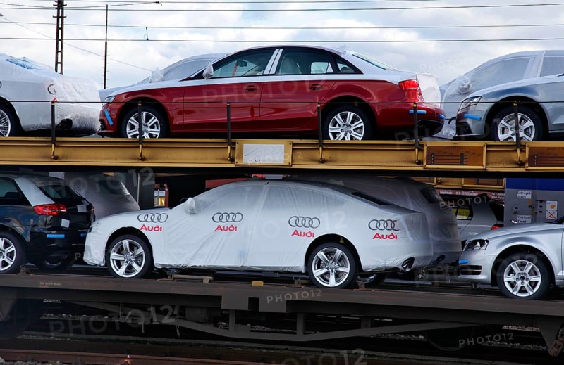 Bremerhaven, 29/09/2010 - A goods train loaded with new Audi vehicles in Bremerhaven. The vehicles are loaded onto special ships for export, Bremerhaven, Germany, Europe
