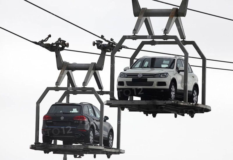 Bratislava, 05.10.2010, VW Touareg sport-utility vehicles are carried by a lift from an assembly line to the test grounds at the Volkswagen AG factory in Bratislava, Slovakia, Slovakia, Europe