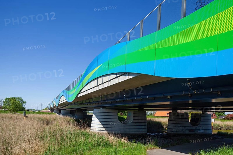 Colourfully painted motorway bridge with noise barrier over the river Este, Buxtehude, Altes Land, Lower Saxony, Germany, Europe