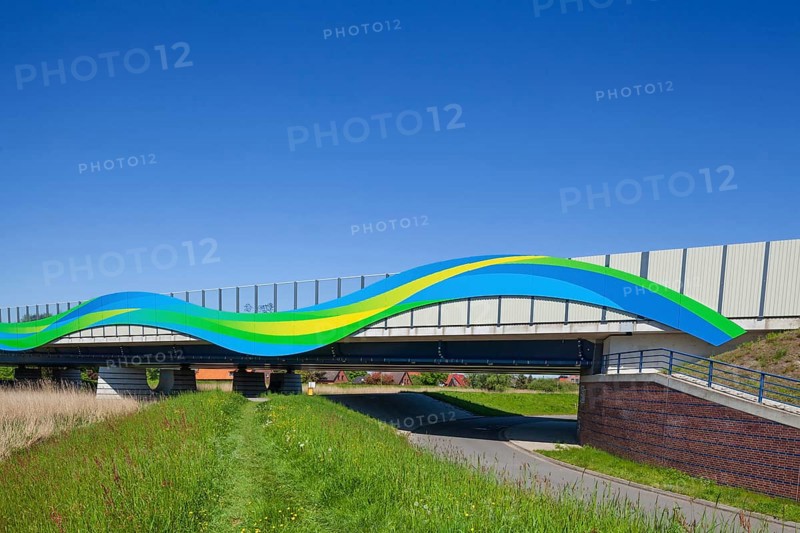Colourfully painted motorway bridge with noise barrier over the river Este, Buxtehude, Altes Land, Lower Saxony, Germany, Europe