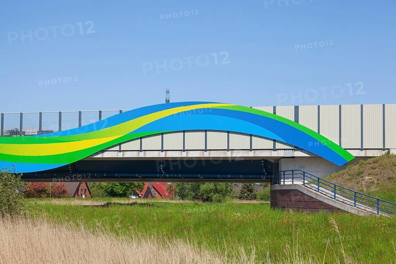 Colourfully painted motorway bridge with noise barrier over the river Este, Buxtehude, Altes Land, Lower Saxony, Germany, Europe