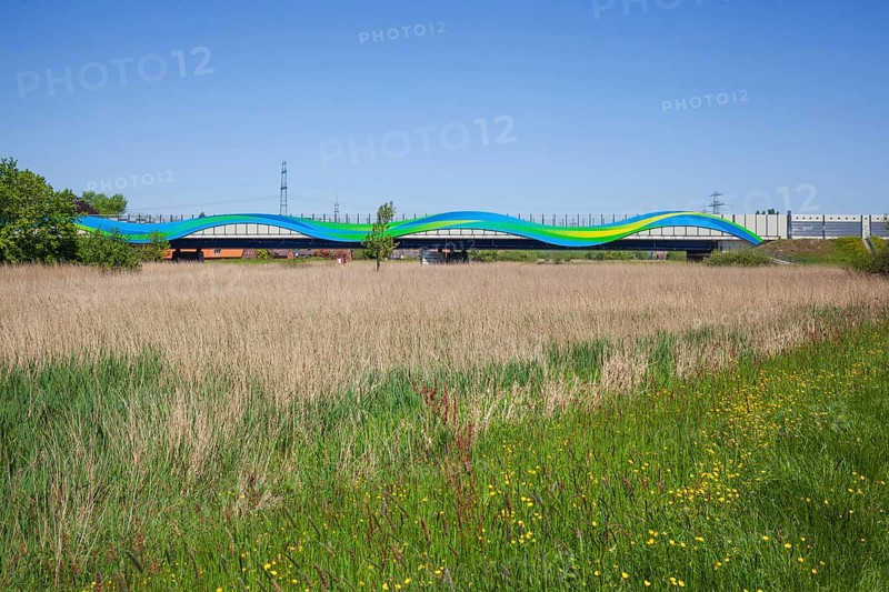 Colourfully painted motorway bridge with noise barrier over the river Este, Buxtehude, Altes Land, Lower Saxony, Germany, Europe