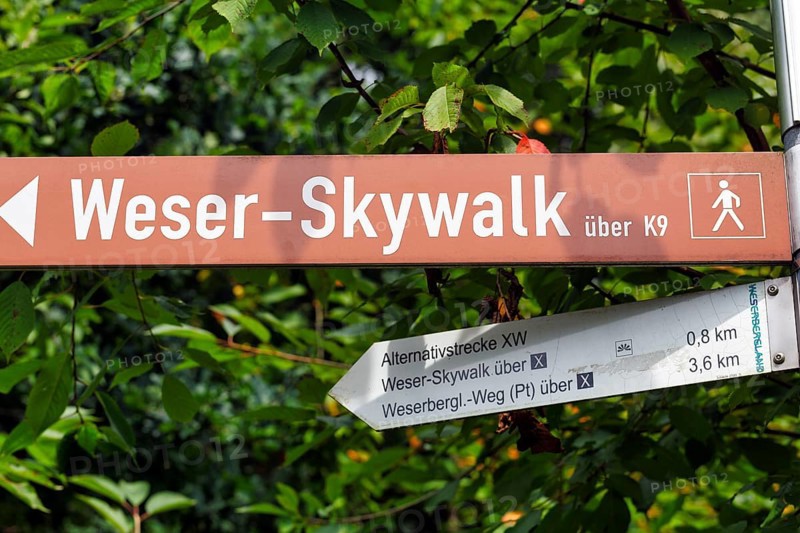 Direction sign, hiking trail to the Weser Skywalk, lettering, pictogram hiker, Weserbergland, Bad Karlshafen, Hesse, Germany, Europe
