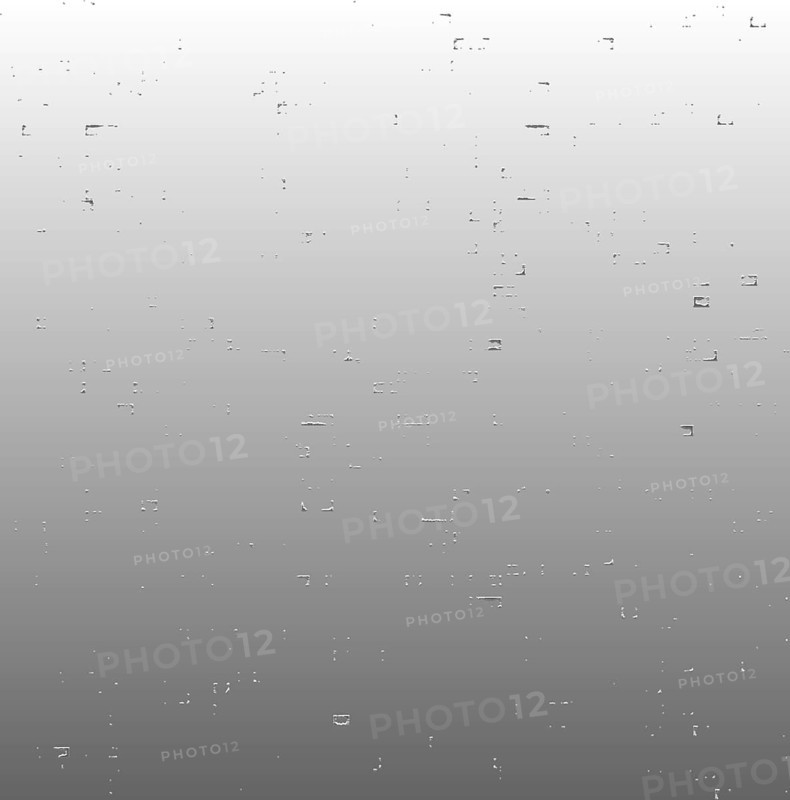 Raindrops trickling down a window on a grey, overcast day creating a calm and serene atmosphere