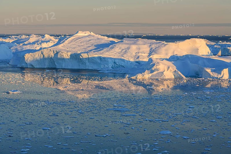 Icebergs reflected in fjord, midnight sun, summer, Ilulissat Icefjord, Disko Bay, West Greenland, Greenland, North America