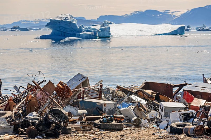 Rubbish dump, waste, electronic waste in front of icebergs in fjord, environmental pollution, Arctic, Uummannaq, West Greenland, Greenland, North America