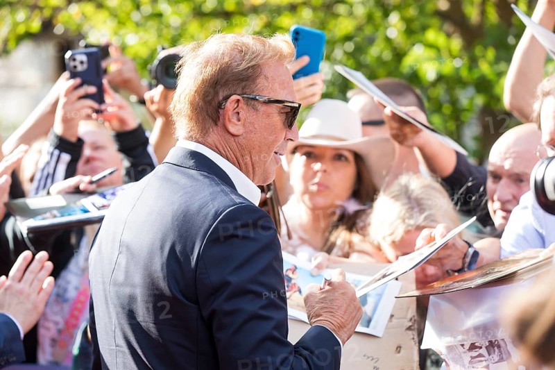 Kevin Costner signs autographs at the premiere of Horizon at Berlin's Zoo Palast on 04/08/2024