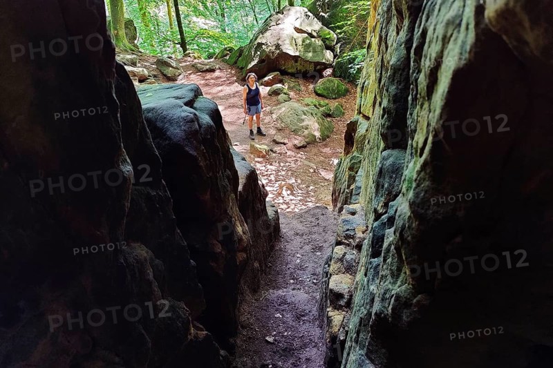 View from a crevice onto the Teuflische Acht hiking trail, Naturpark Südeifel, Irrel, Eifel, Rhineland-Palatinate, Germany, Europe