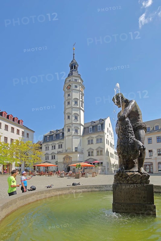 Simson Fountain with sculptures, lion figure, Simson, biblical, water jet, water basin, people and Renaissance town hall, market square, Gera, Thuringia, Germany, Europe