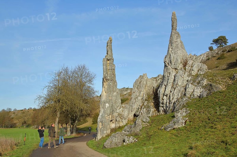 Brenztal with rock formations Steinerne Jungfrauen, pedestrians taking photos, Eselsburger Tal, Eselsburg, Herbrechtingen, Swabian Alb, Baden-Württemberg, Germany, Europe