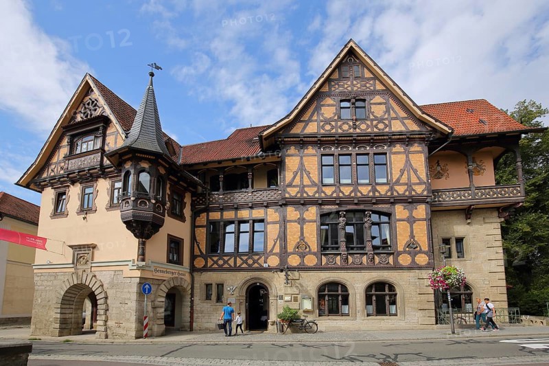 Henneberger Haus built in 1895, brown half-timbered house with bay windows, ornaments and turrets, Meiningen, Thuringia, Germany, Europe
