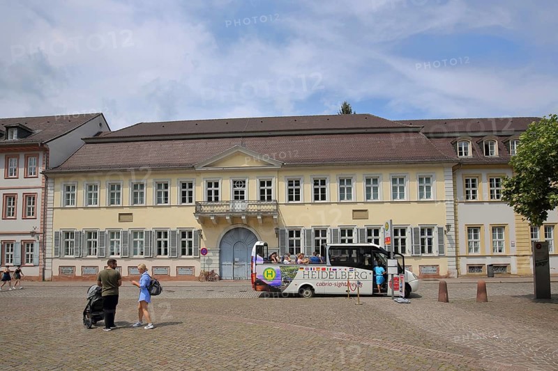 Karlsplatz with Palais Boisserée, people and tourist bus, touristsHeidelberg, Bergstrasse, Baden-Württemberg, Germany, Europe
