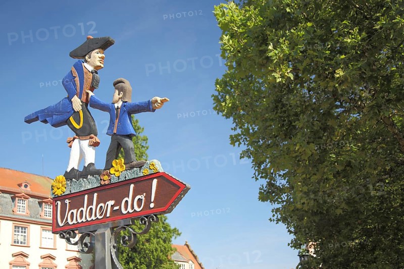 Sign with figures and inscription Vadder-do in Hessian dialect, father, son, look, show, traditional costume, clothing, historical, blue, direction, Hessian, market square, Erbach, Hesse, Odenwald, Germany, Europe